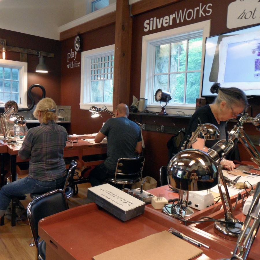 students at the benches in class
