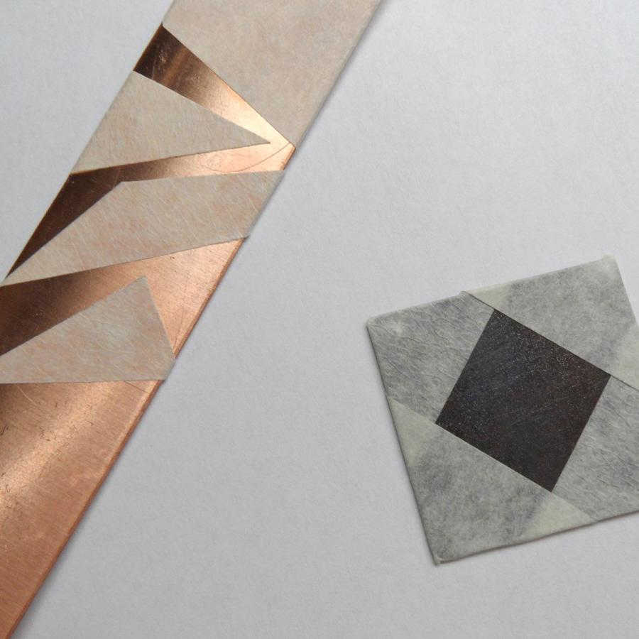 sand blasted copper and silver with parts taped to retain shine