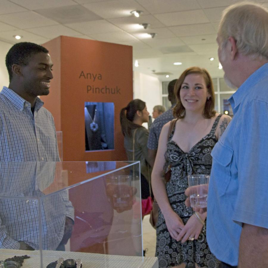 Heather talking to guests