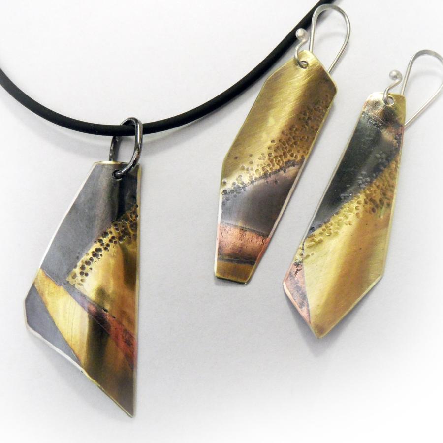 married metal matching pendant and earrings