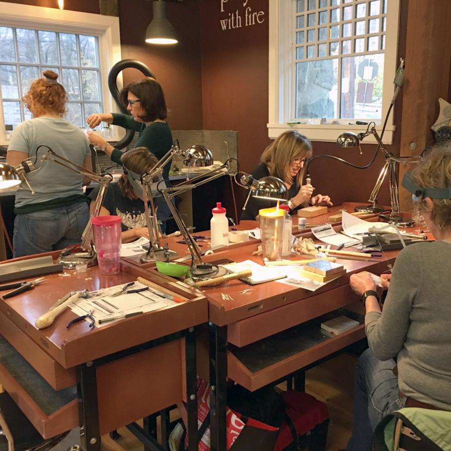 Students in studio 2 learning to make chain