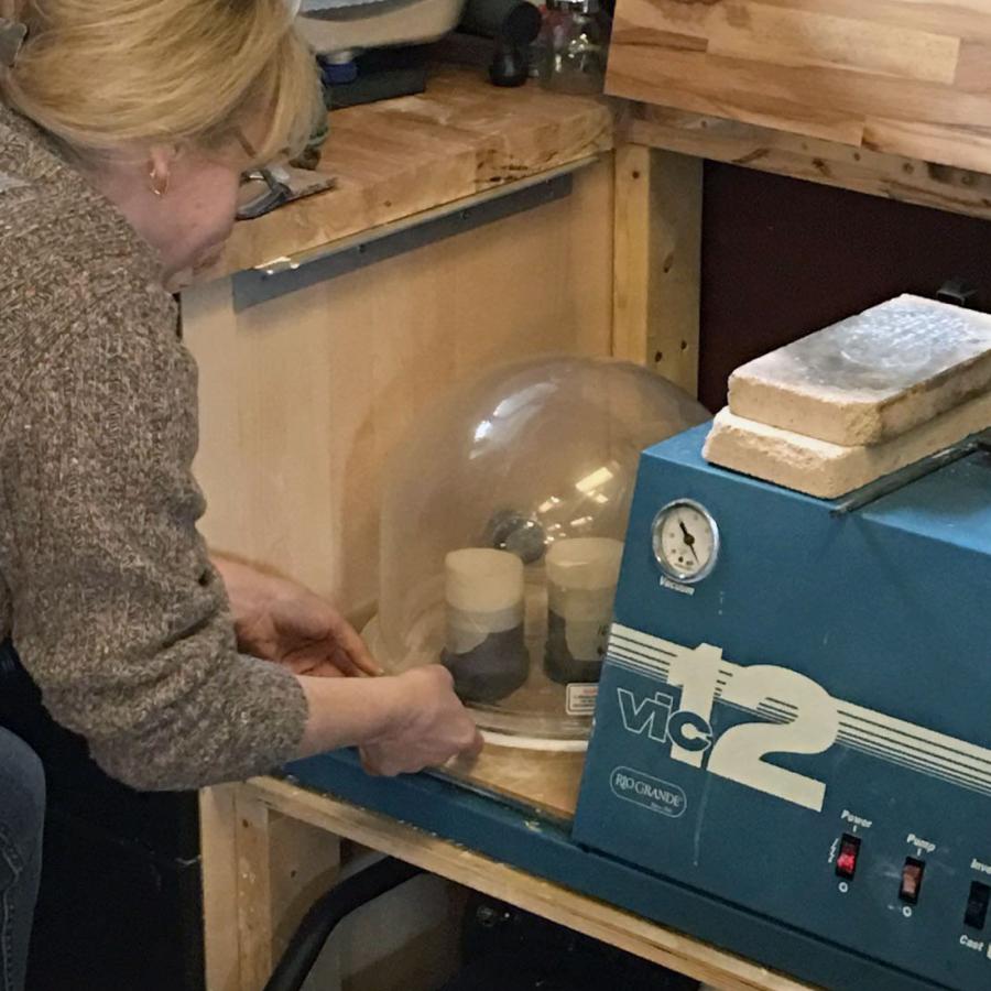 Natalia running the vacuum caster