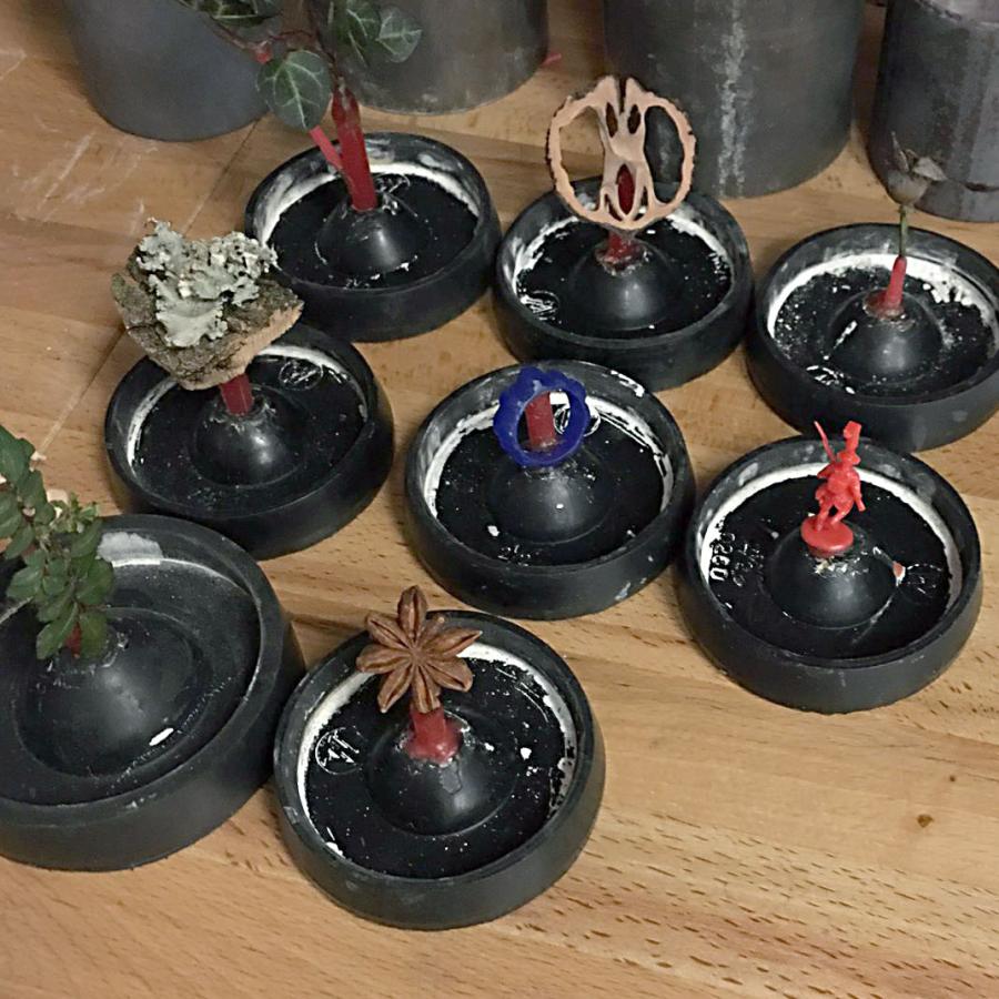 organics, plastics, and wax in trays prepped to be made into molds