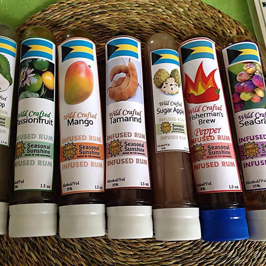 bottles of various fruit rum infusions