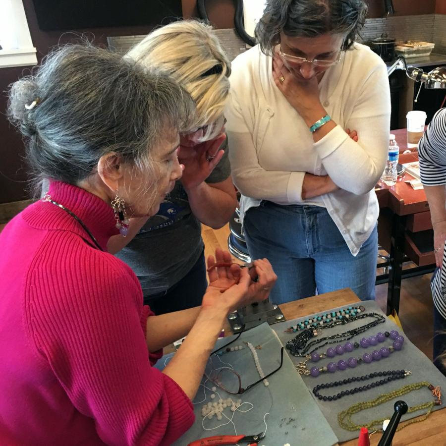 Ruth is instructing how to form an eye pin. L-R Ruth, Cezanne, Marie, Harriet, Sara.