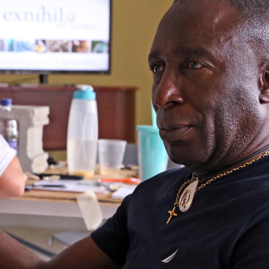 tyrone ferguson sitting at the workshop