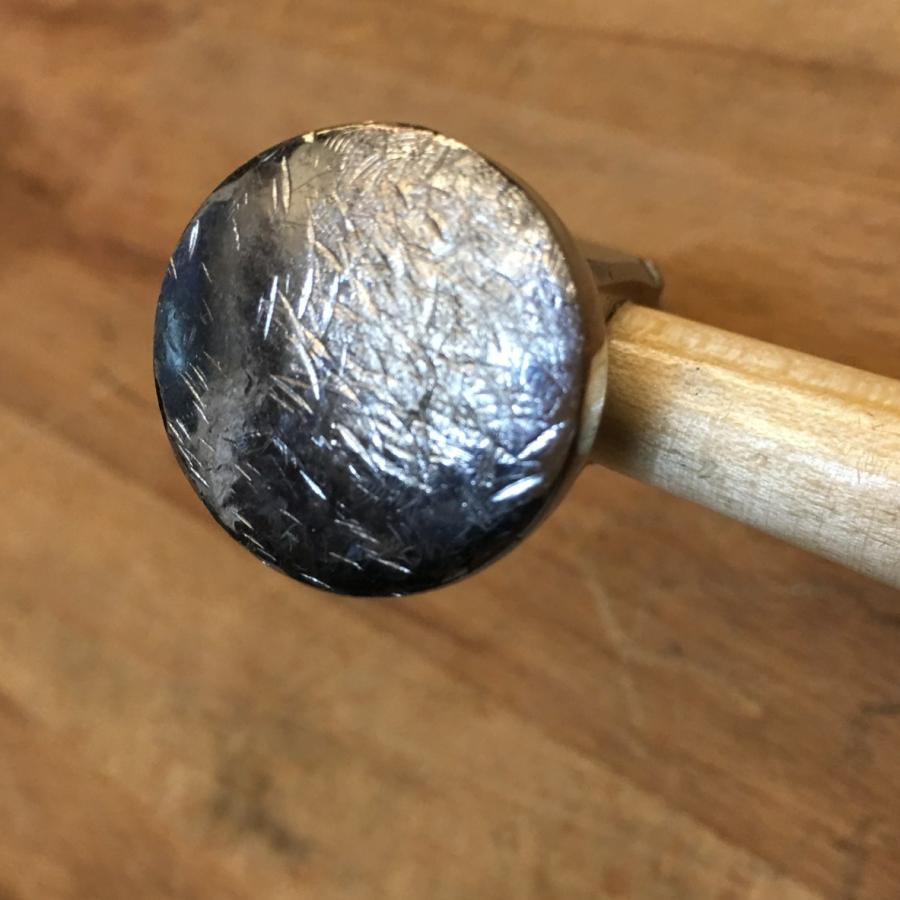 marred surface of a chasing hammer