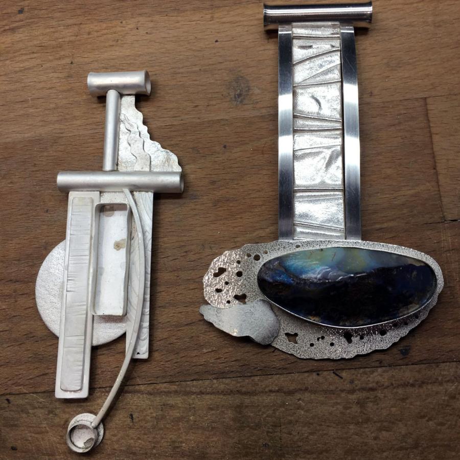 two unfinished pendants 