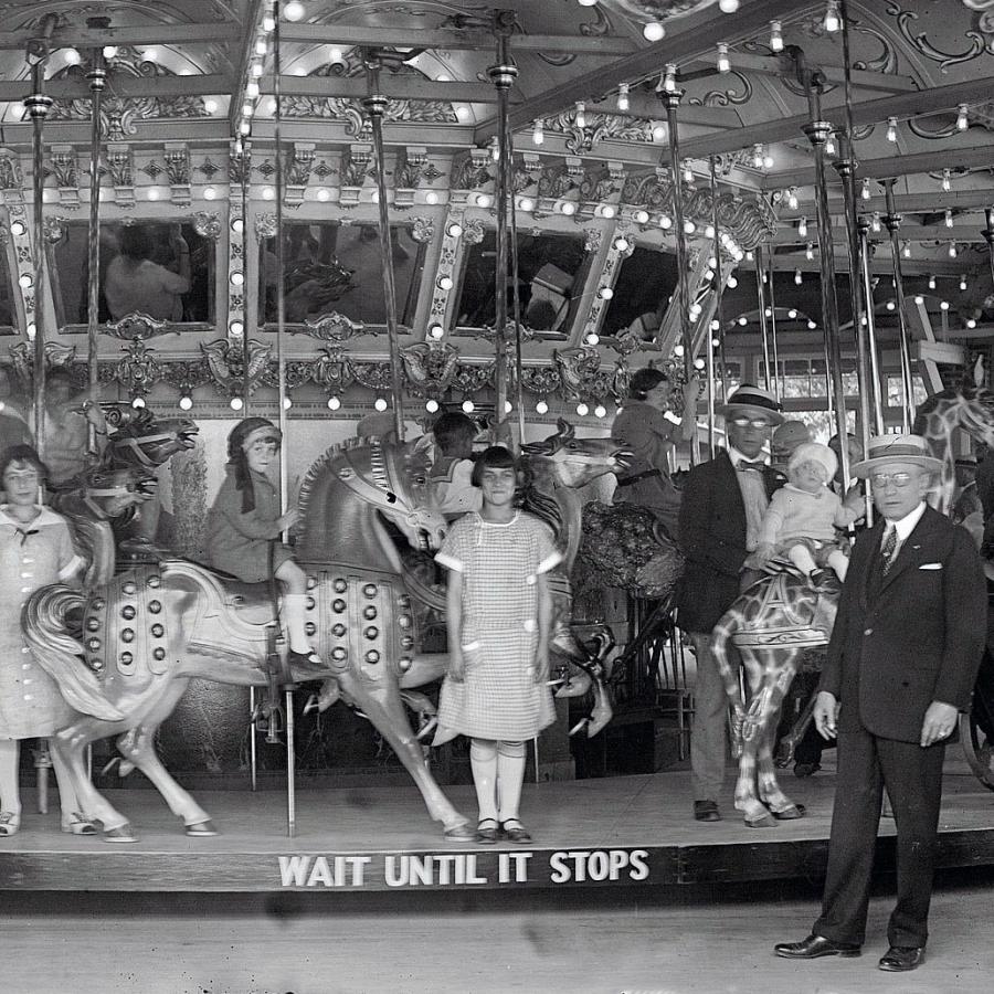 black and white photo of carousel