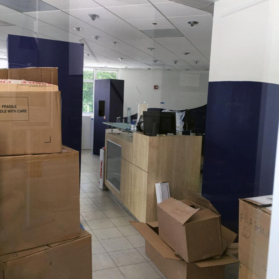 boxes stacked in gallery space