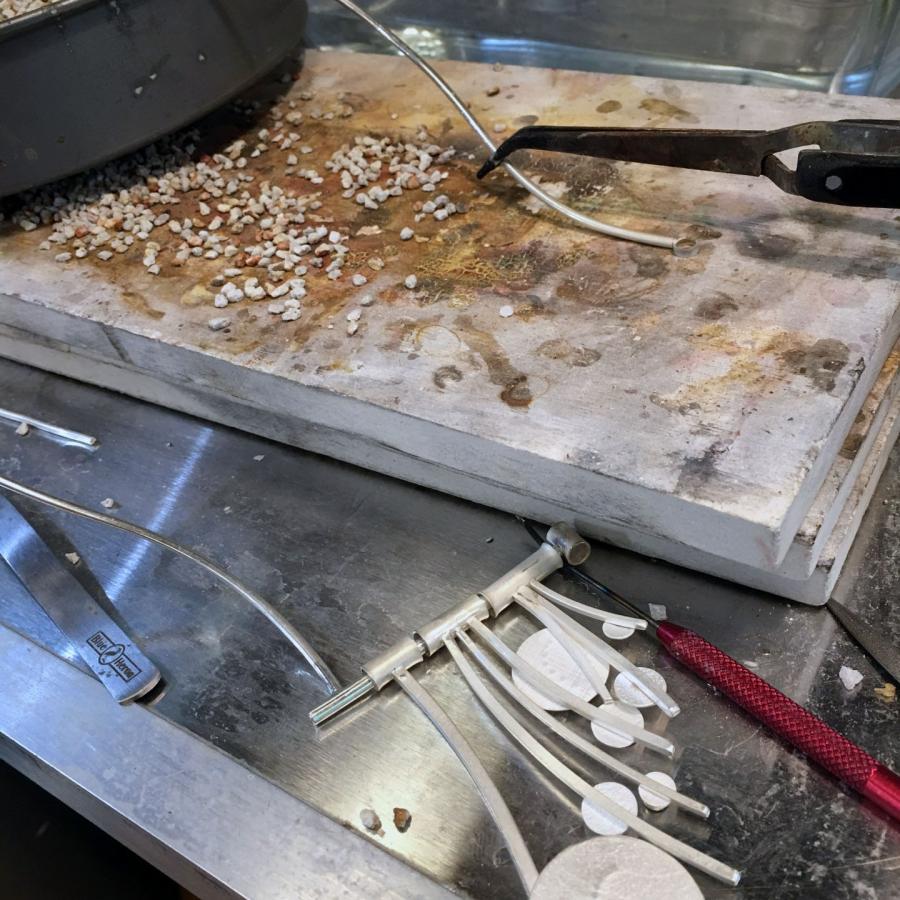 staging for soldering the wire necklace part of the piece