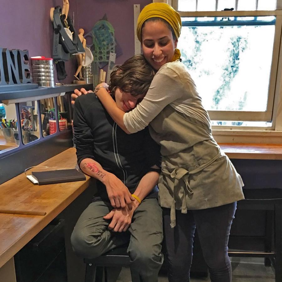 Mawadda hugging a sad Louis