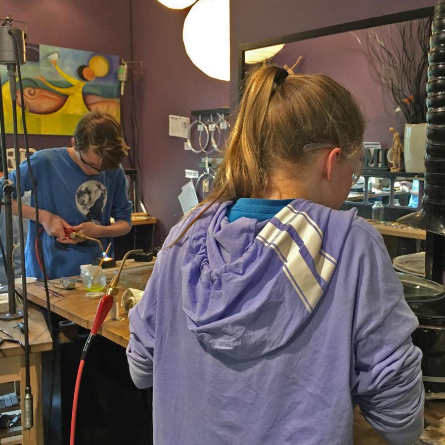 campers at the work bench