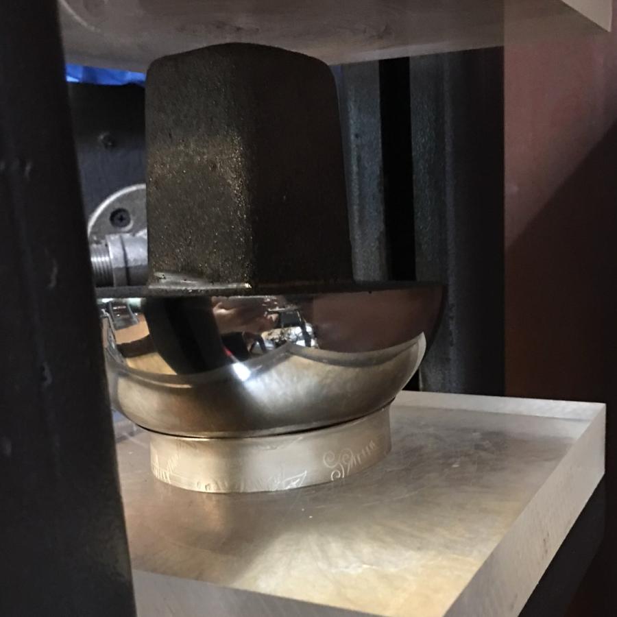 using hydraulic press on thick bangle to create flange on one side
