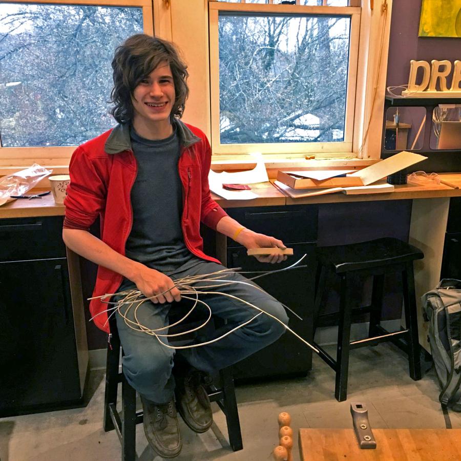 Louis holding wire that he has pulled