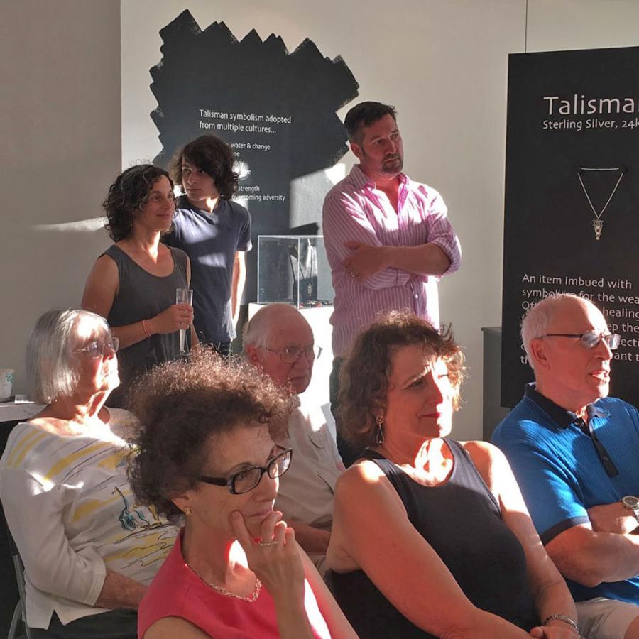 Louis' family and others watching the artist talk