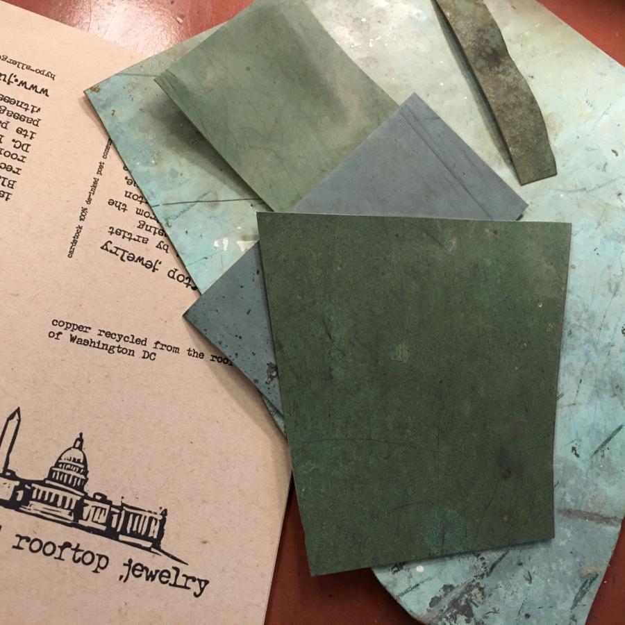 pieces of rooftop copper with green and blue patina 