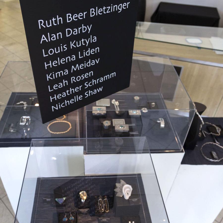 Sign displaying faculty names above works