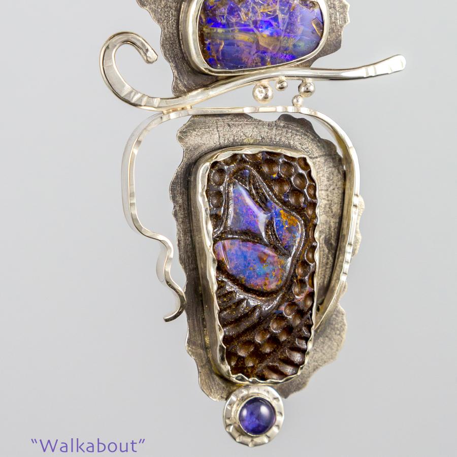 Silver textured pendant with multi-colored purple stones