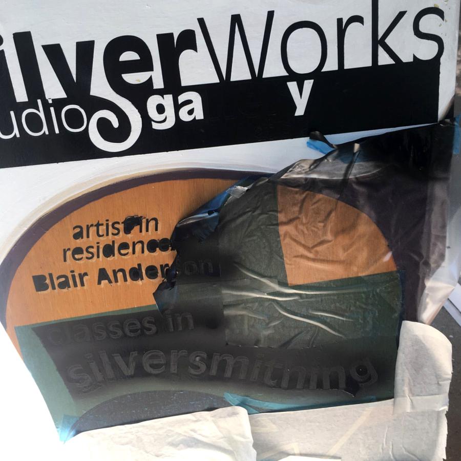 repainting the studio sandwich board