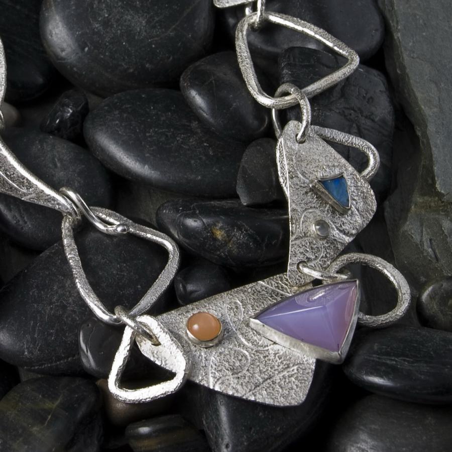 Silver chain with multiple stones