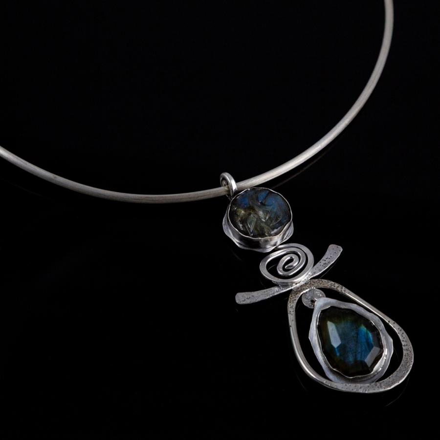Silver pendant with blue stones