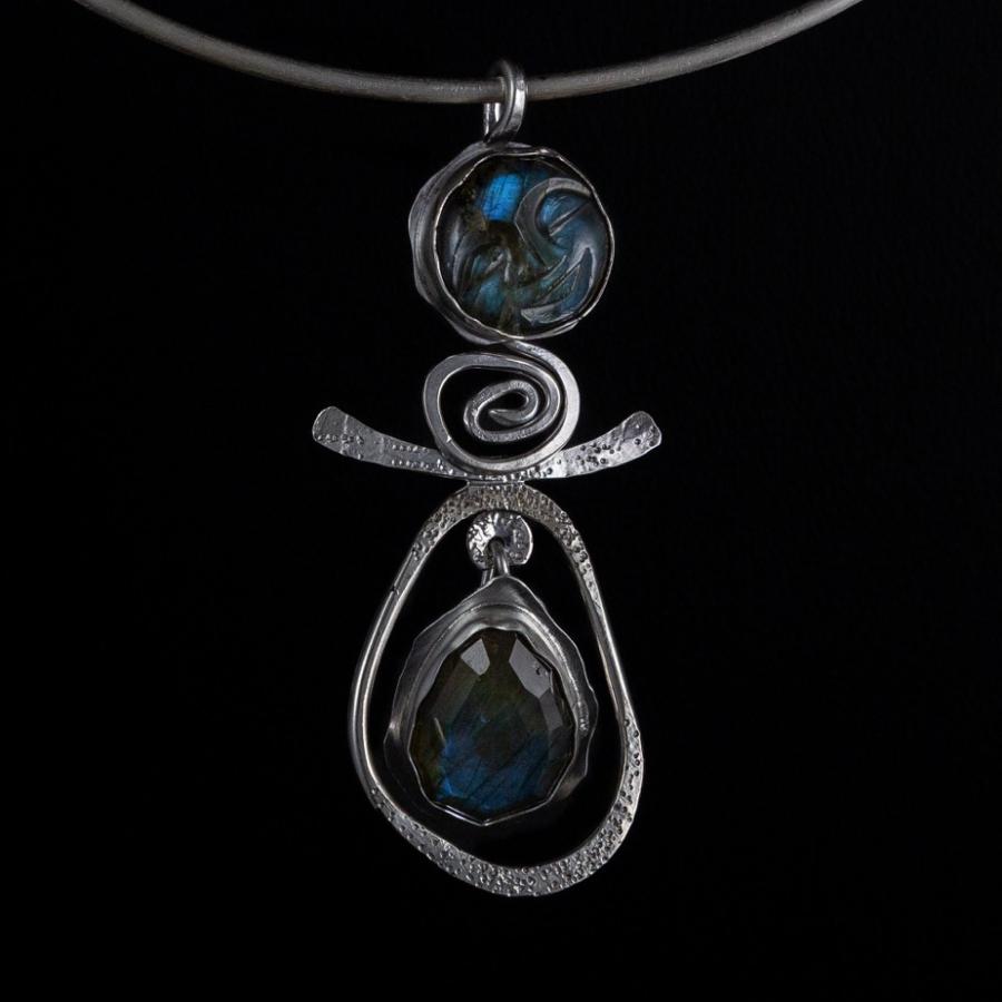 Silver pendant with blue stones
