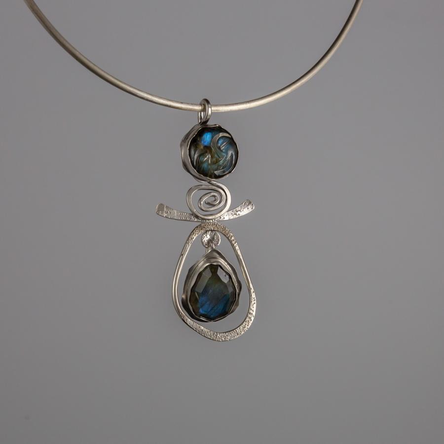Silver pendant with blue stones