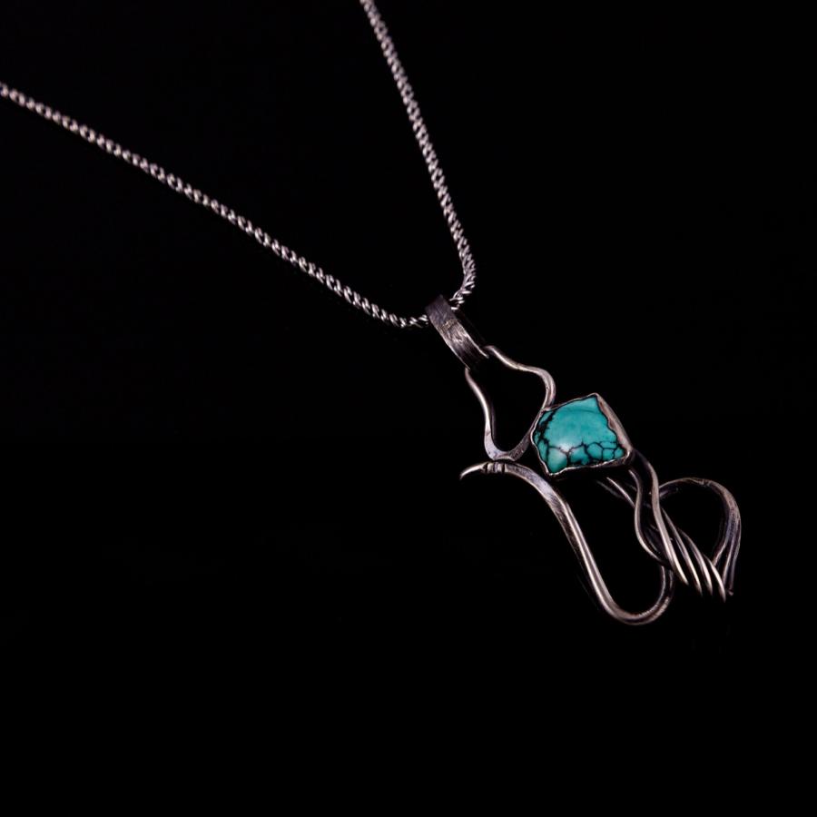 Silver pendant with turquoise