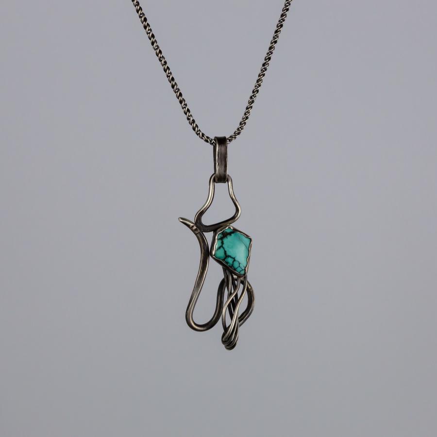 Silver pendant with turquoise