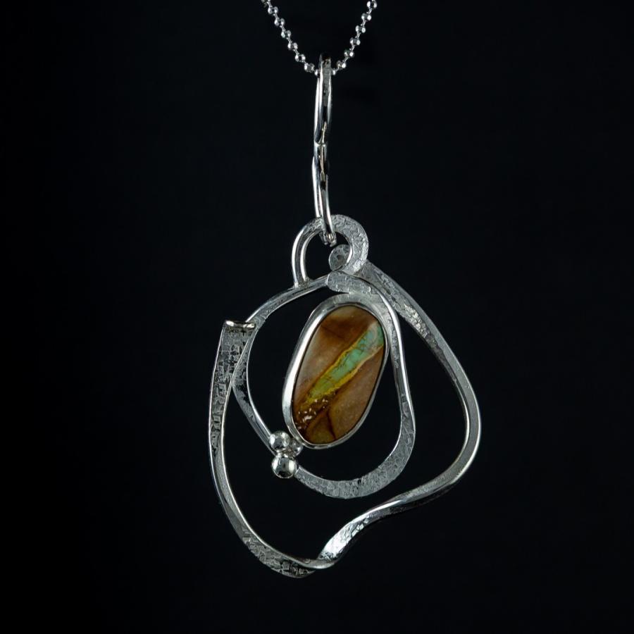 Silver pendant with brown and blue stone