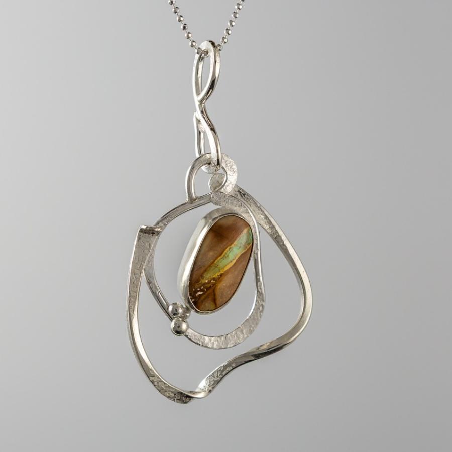 Silver pendant with brown and blue stone