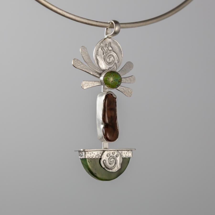 Silver pendant with green and brown stones