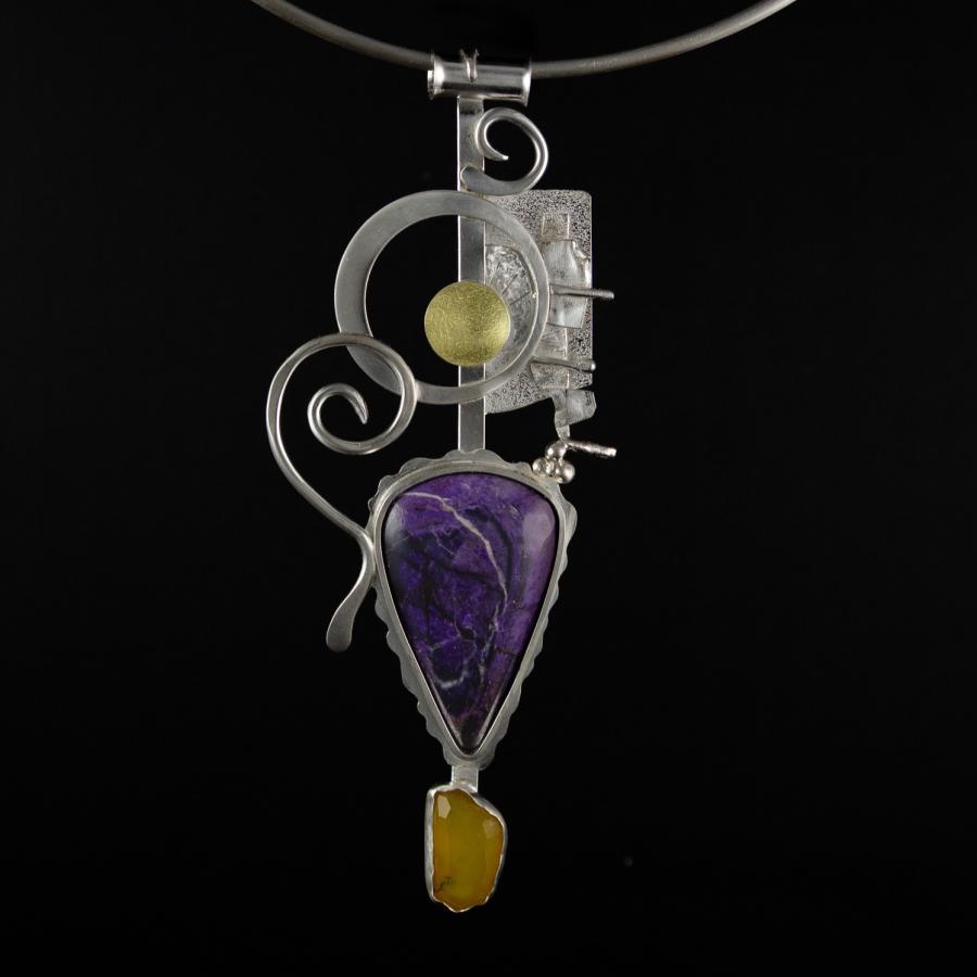 Silver pendant with large purple stone