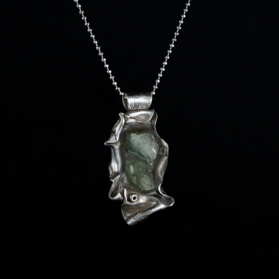 Silver pendant with Roman glass
