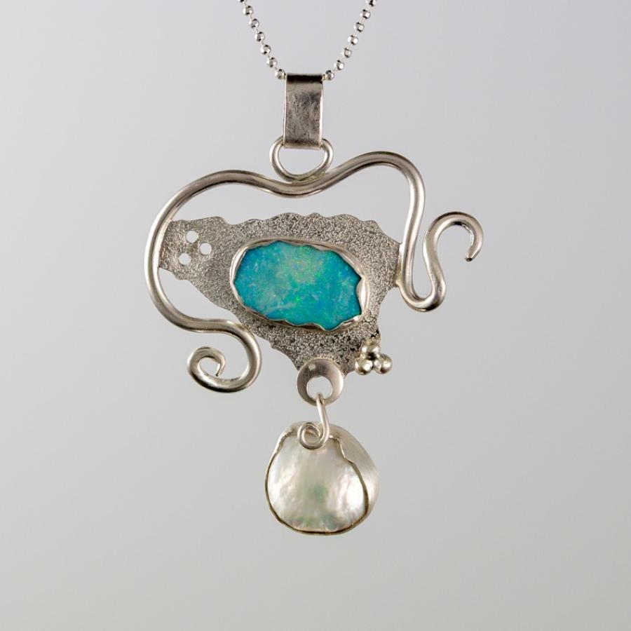 Silver pendant necklace with opal and pearl.