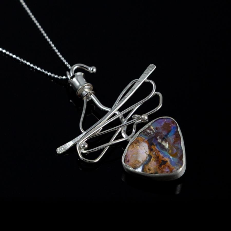 Silver pendant with opal