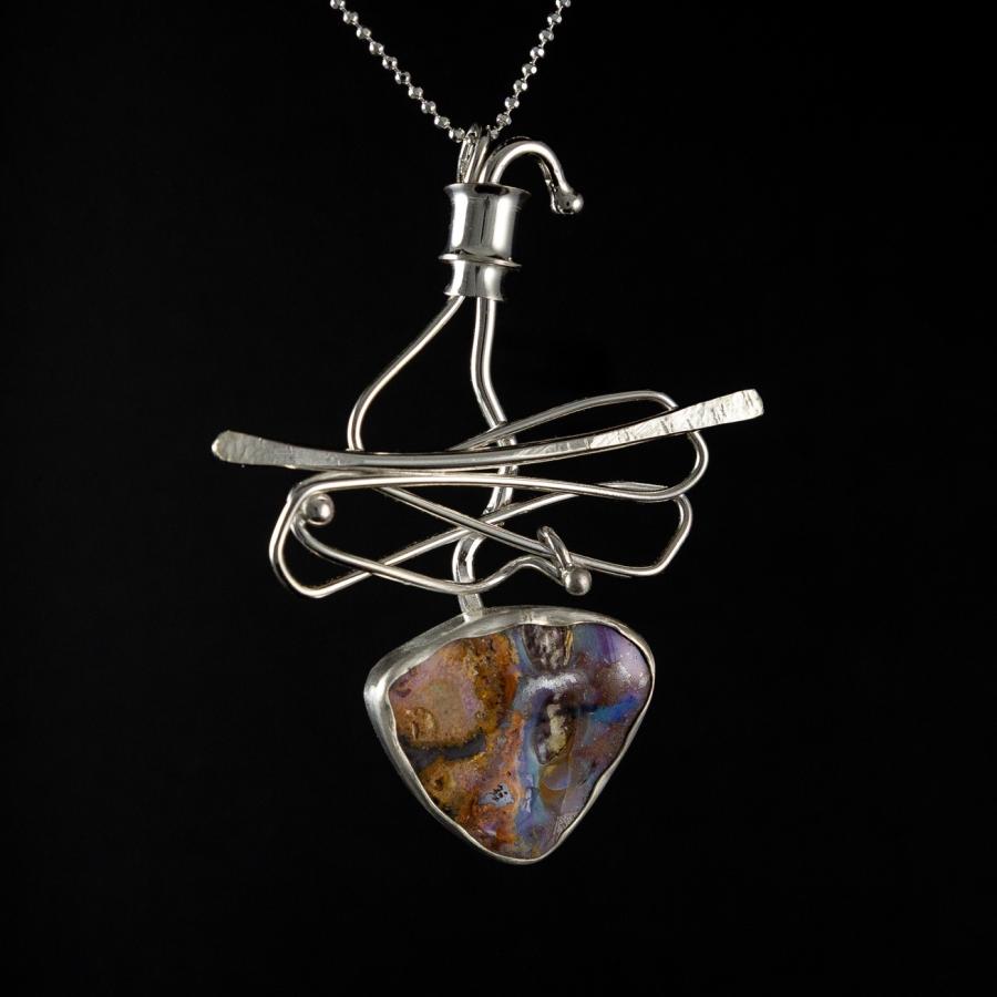 Silver pendant with opal