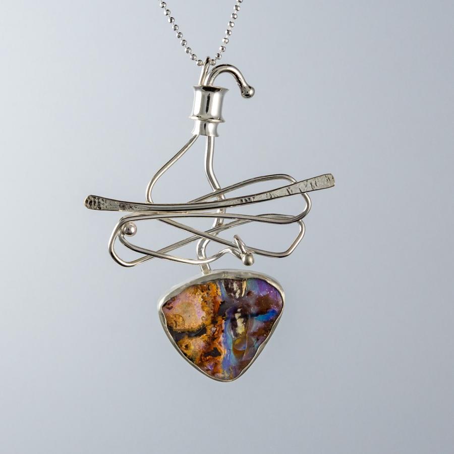 Silver pendant with opal