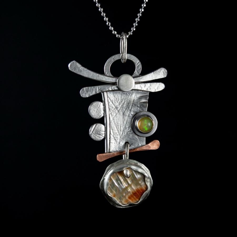 Silver and copper pendant with stones