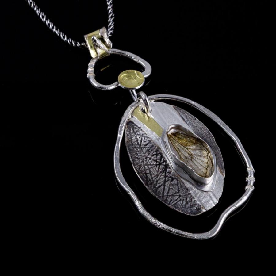 Pendent with silver, gold and insect wing