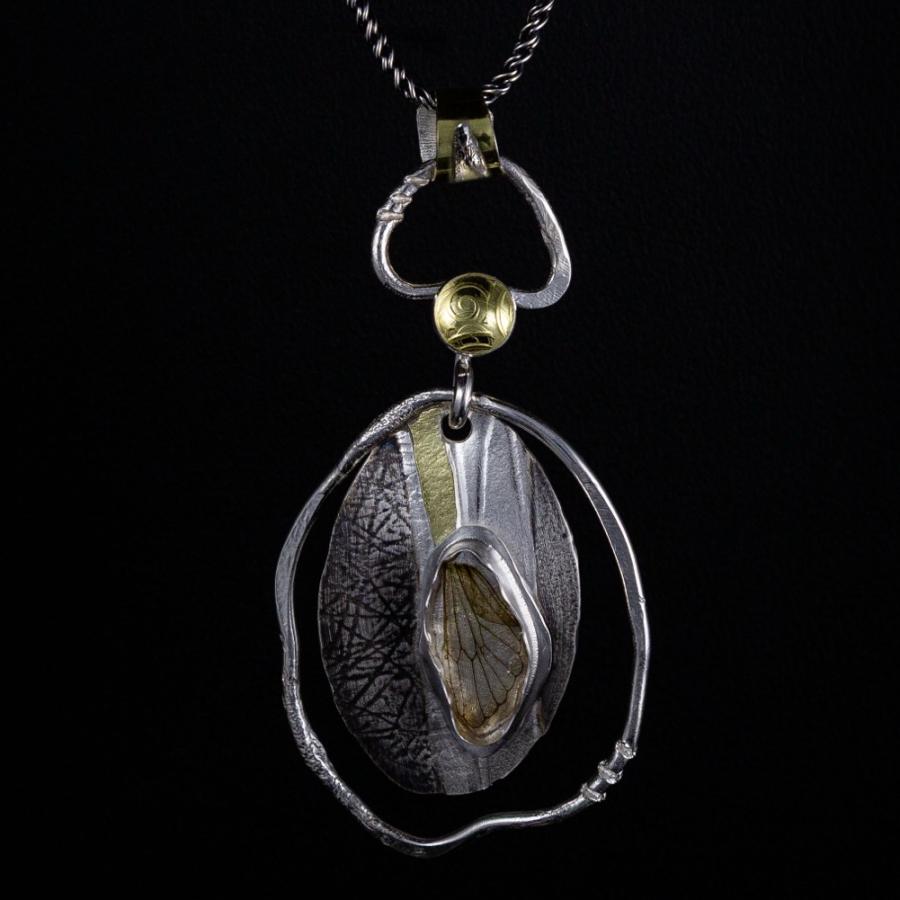 Pendent with silver, gold and insect wing