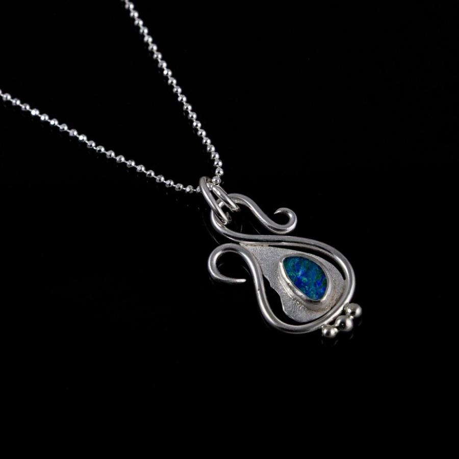 Silver pendant with opal