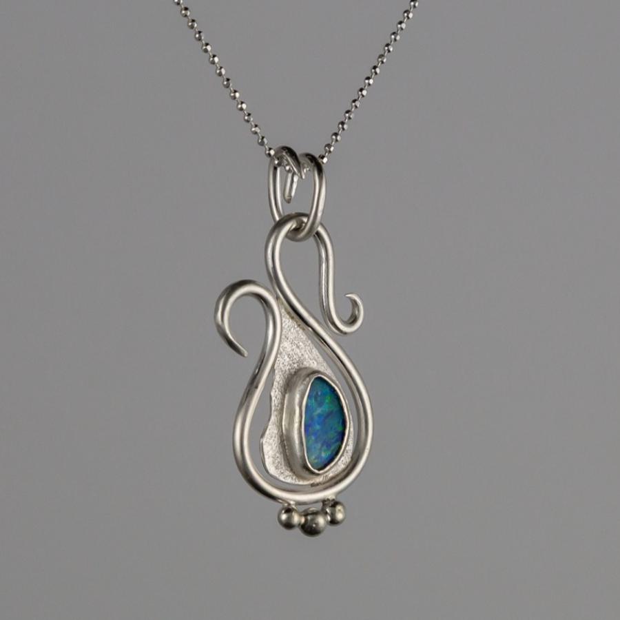 Silver pendant with opal