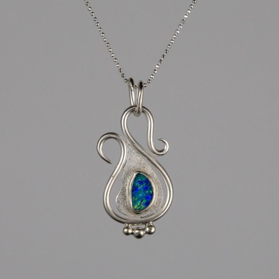 Silver pendant with opal