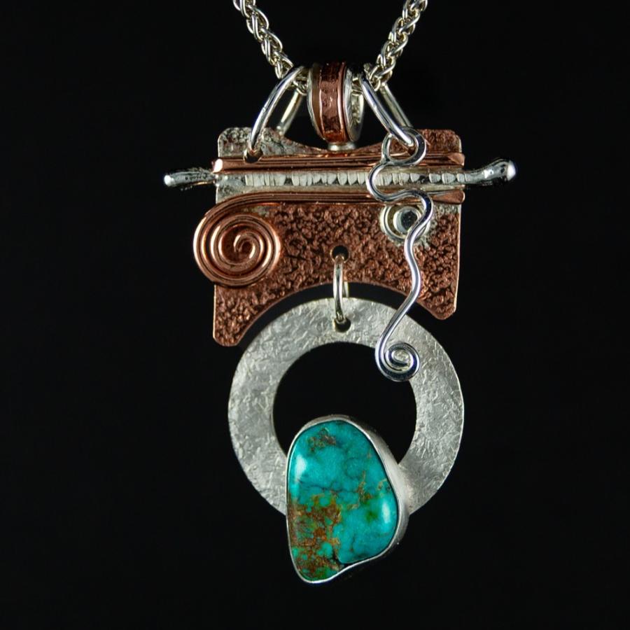 Silver and copper pendant with turquoise stone