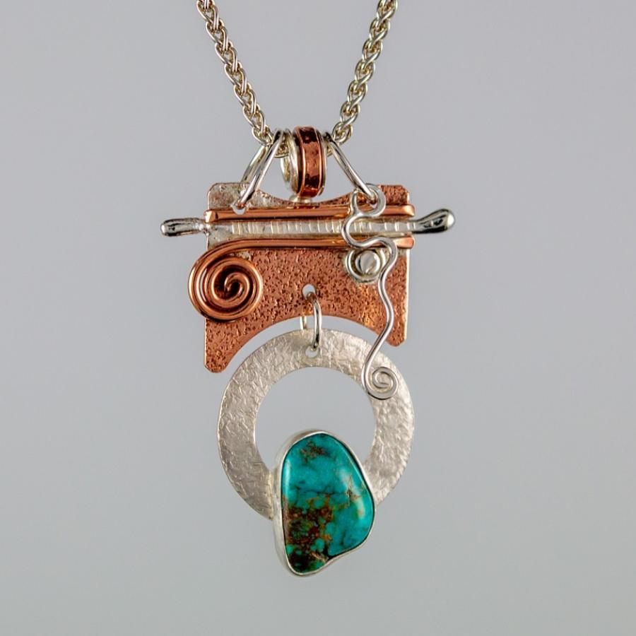 Silver and copper pendant with turquoise stone