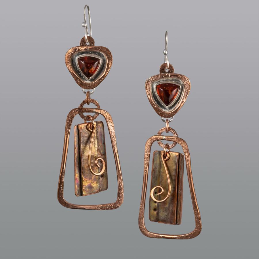 Copper and silver earring with triangular orange stones