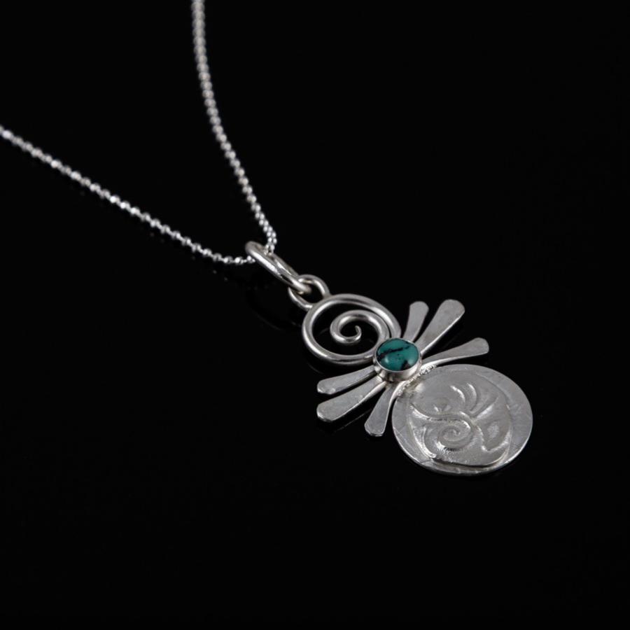 Silver pendant with turquoise stone