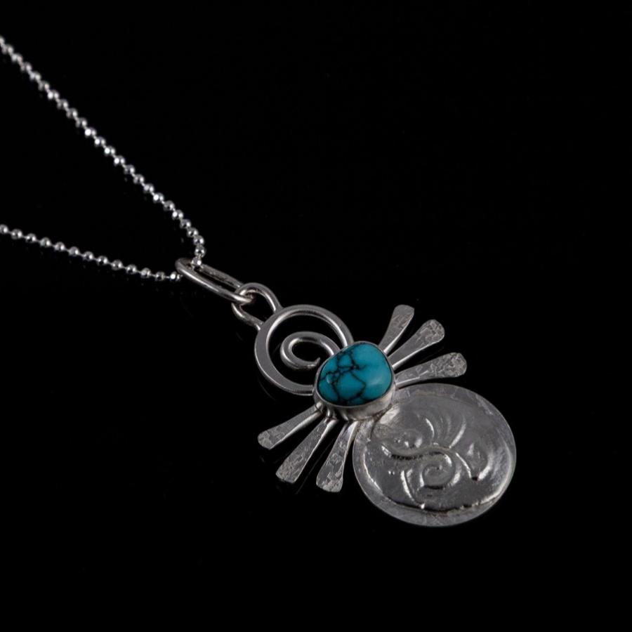 Silver pendant with turquoise stone